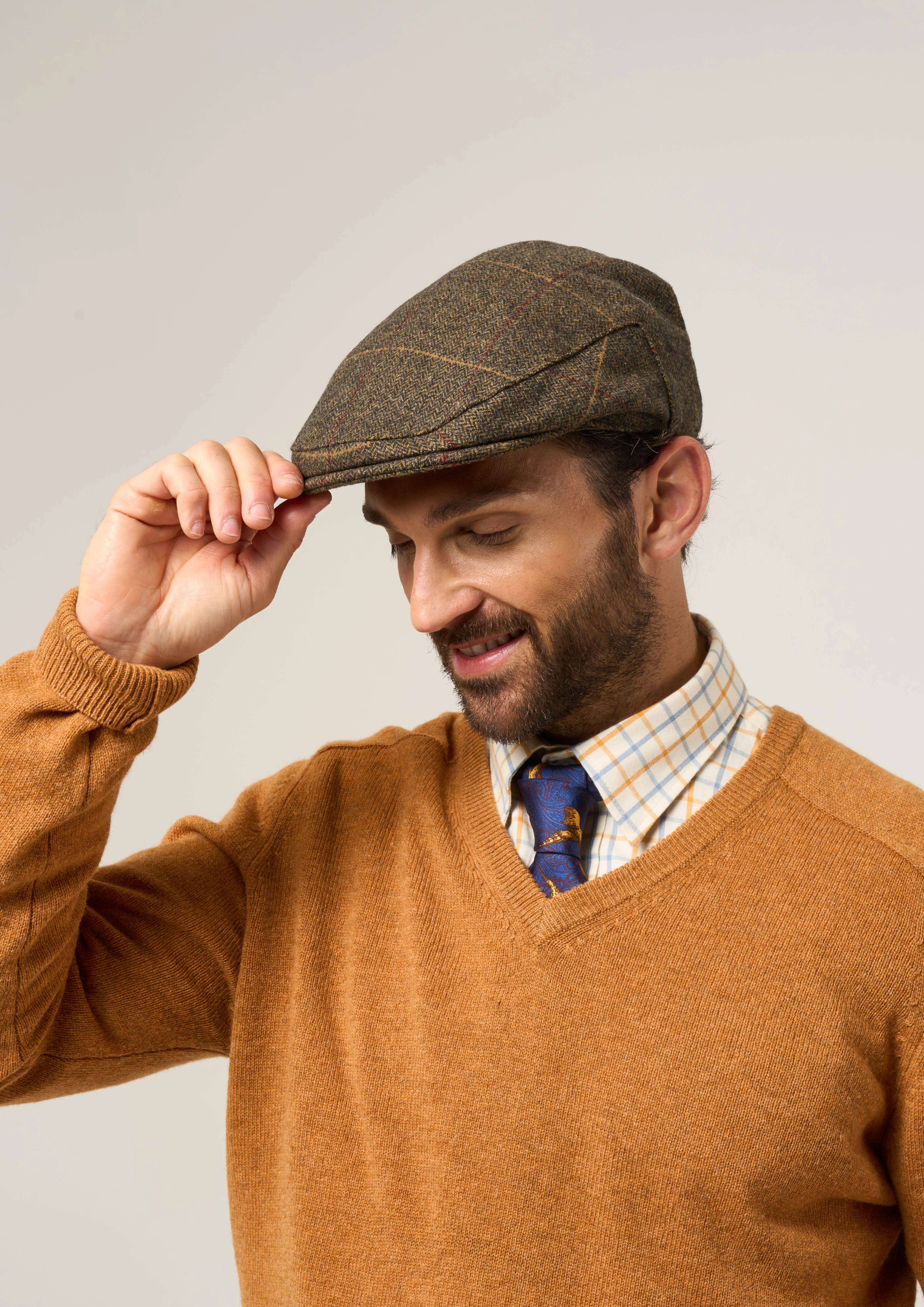 Combrook Men's Tweed Waterproof Flat Cap in Teak  -  Regular Fit - Image 2